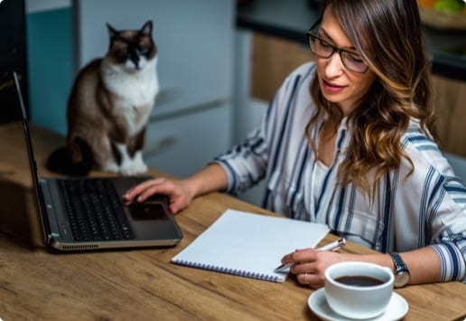 woman working on a computer at a table