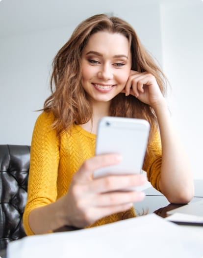 woman looking at phone